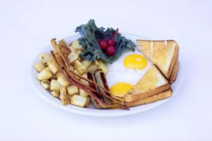 Bacon and eggs breakfast plate